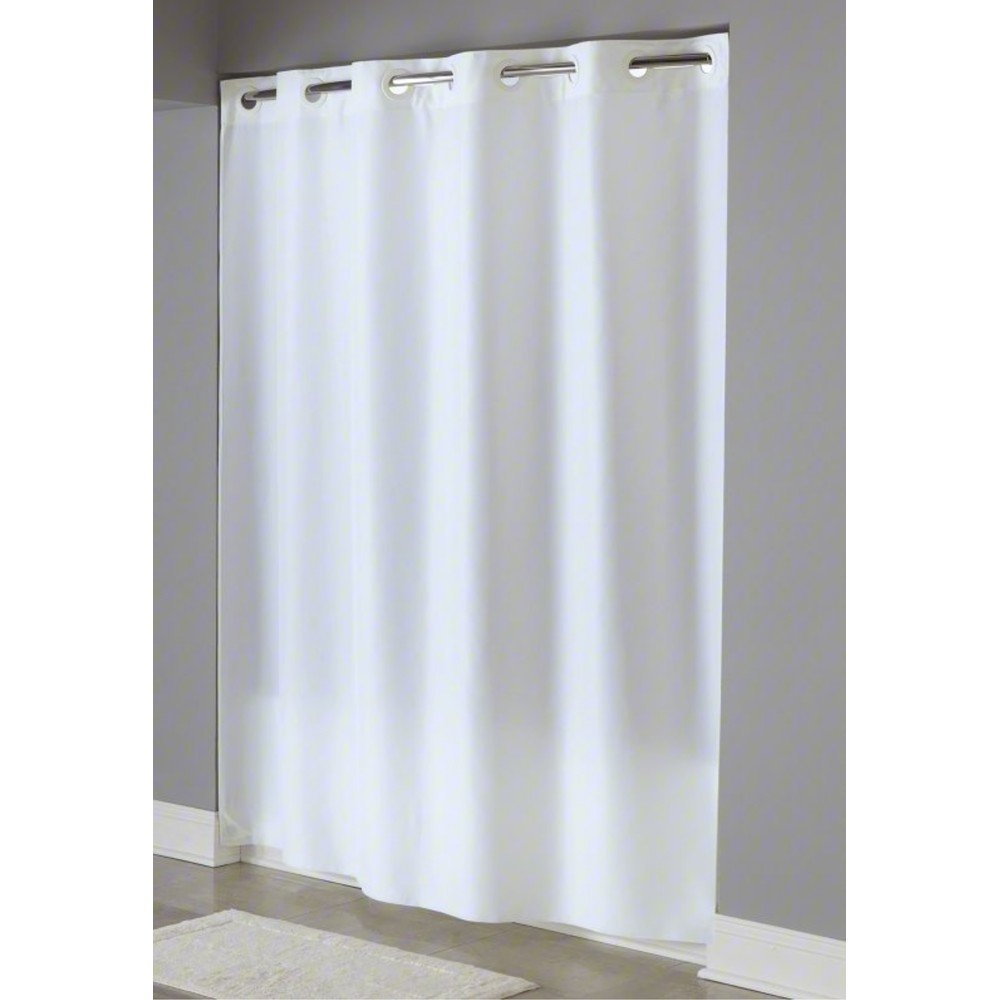 Hookless white solid shower curtain hanging in a bathroom